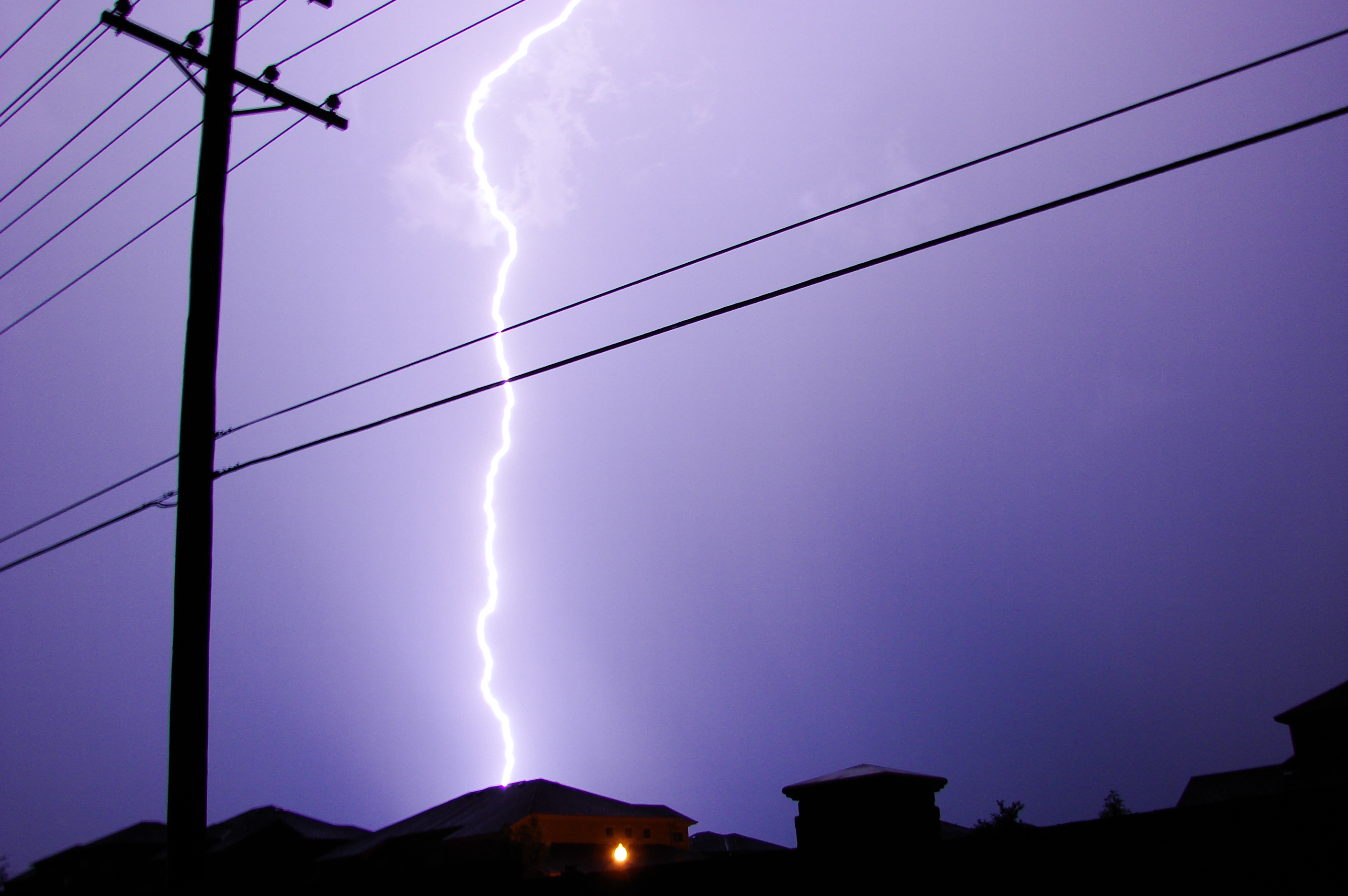 A lightning strike over a residential area in Plano, Texas. Source: David R. Tribble